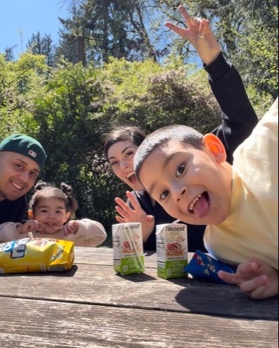 Mary Elena with her family at a picnic